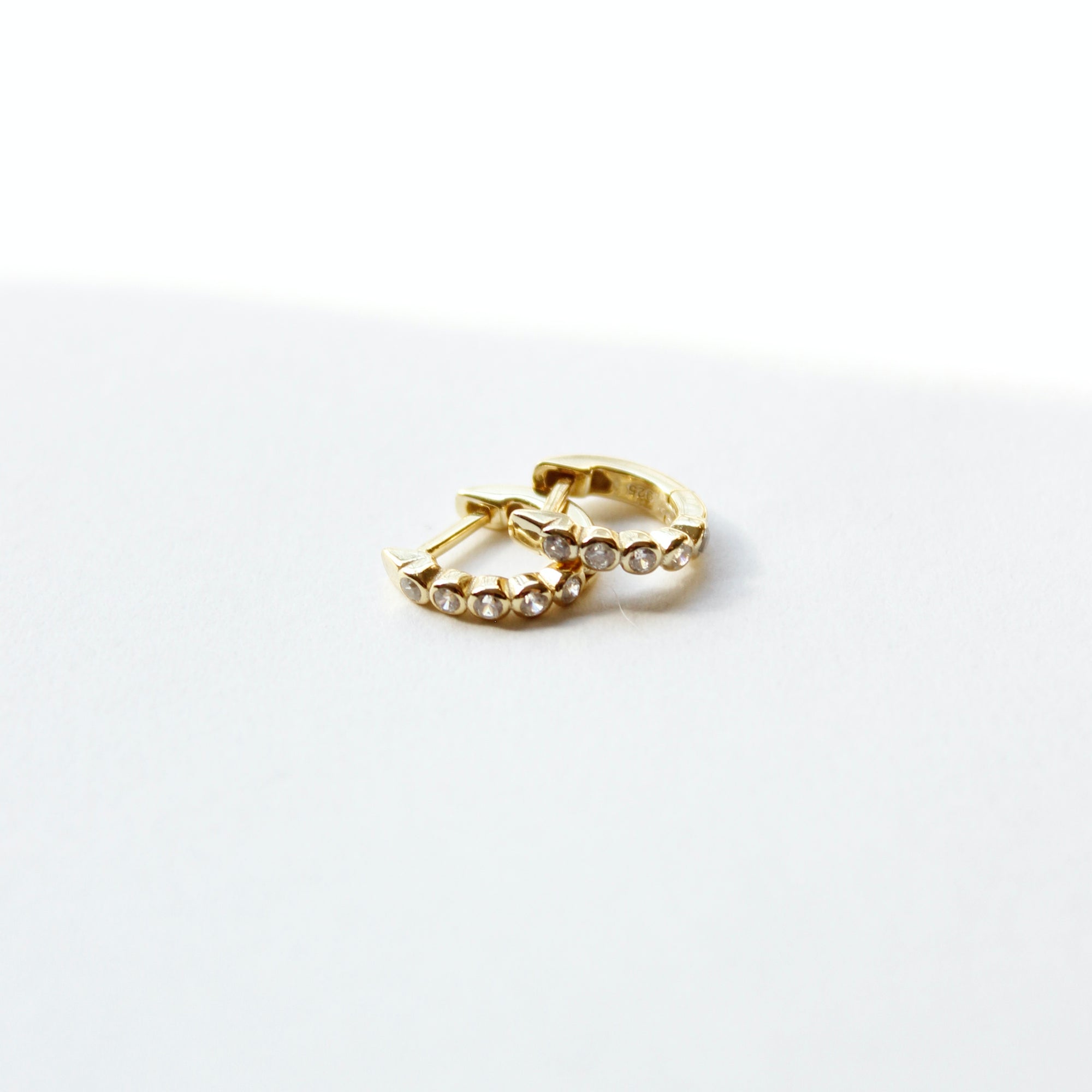 Tiny Bezel Huggie Earrings Earrings P&K Yellow gold  