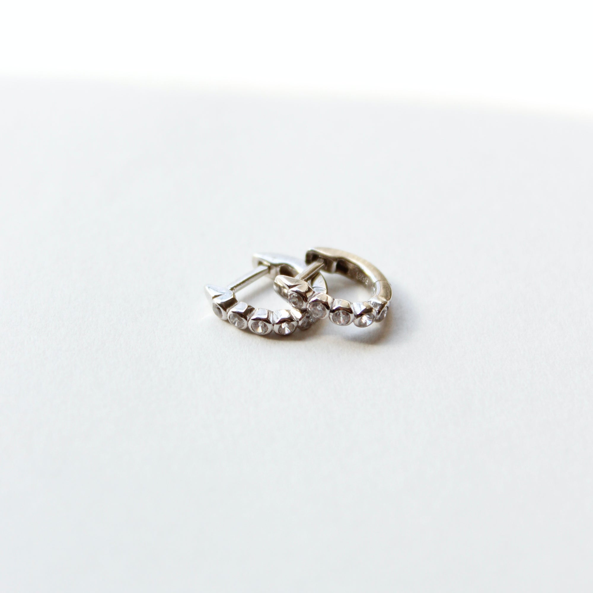 Tiny Bezel Huggie Earrings Earrings P&K Silver  